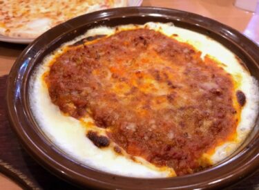 Doria, a dish of butter rice topped with bechamel sauce and baked